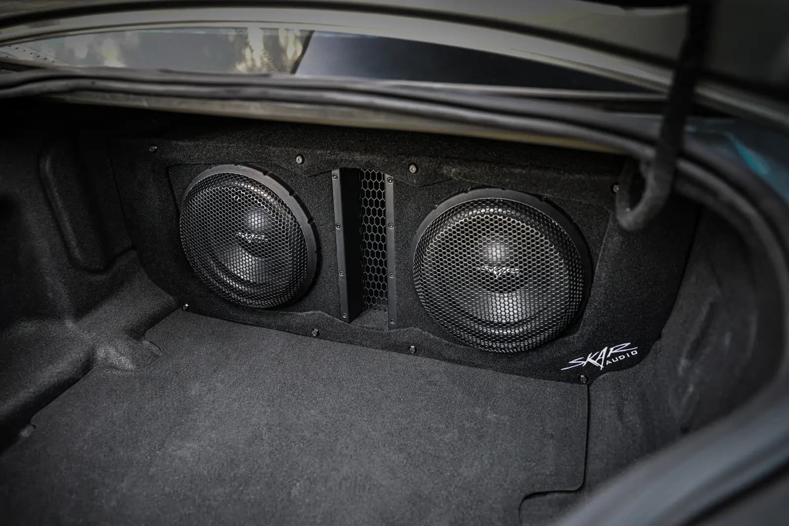 Skar Audio L-VD-VS-2X10CHEVCAM-2016-2024-V enclosure installation example — view 1